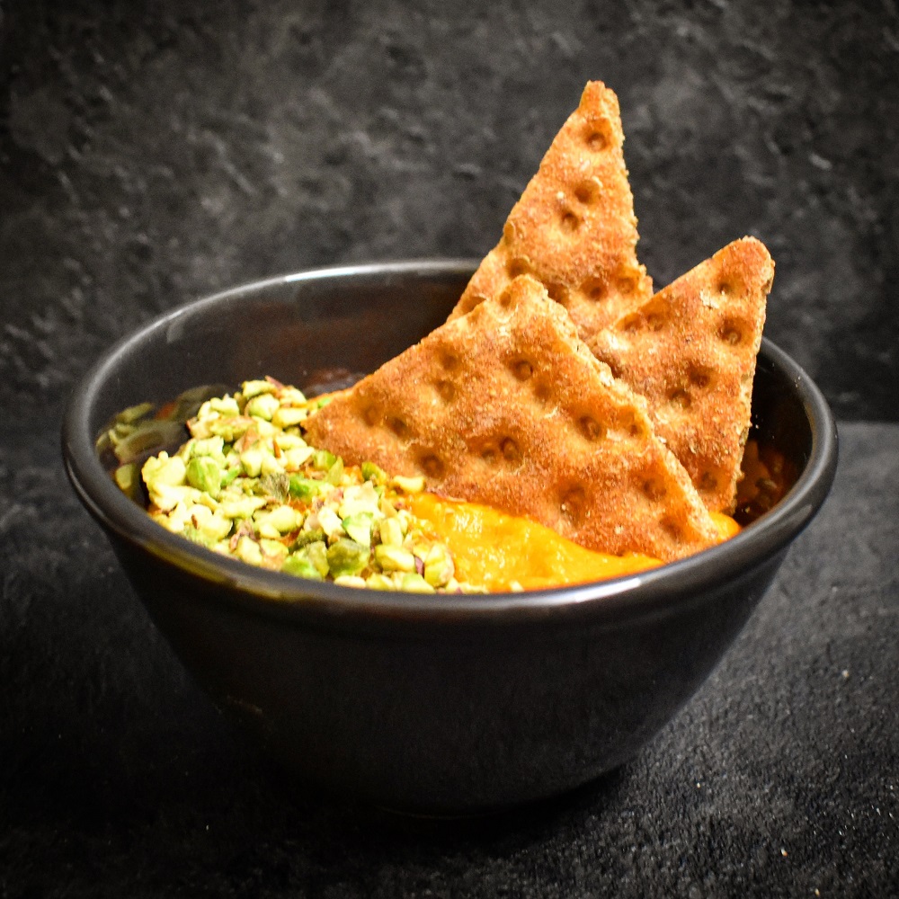 VELLUTATA DI ZUCCA CON TUORLO PISTACCHI E WASA.